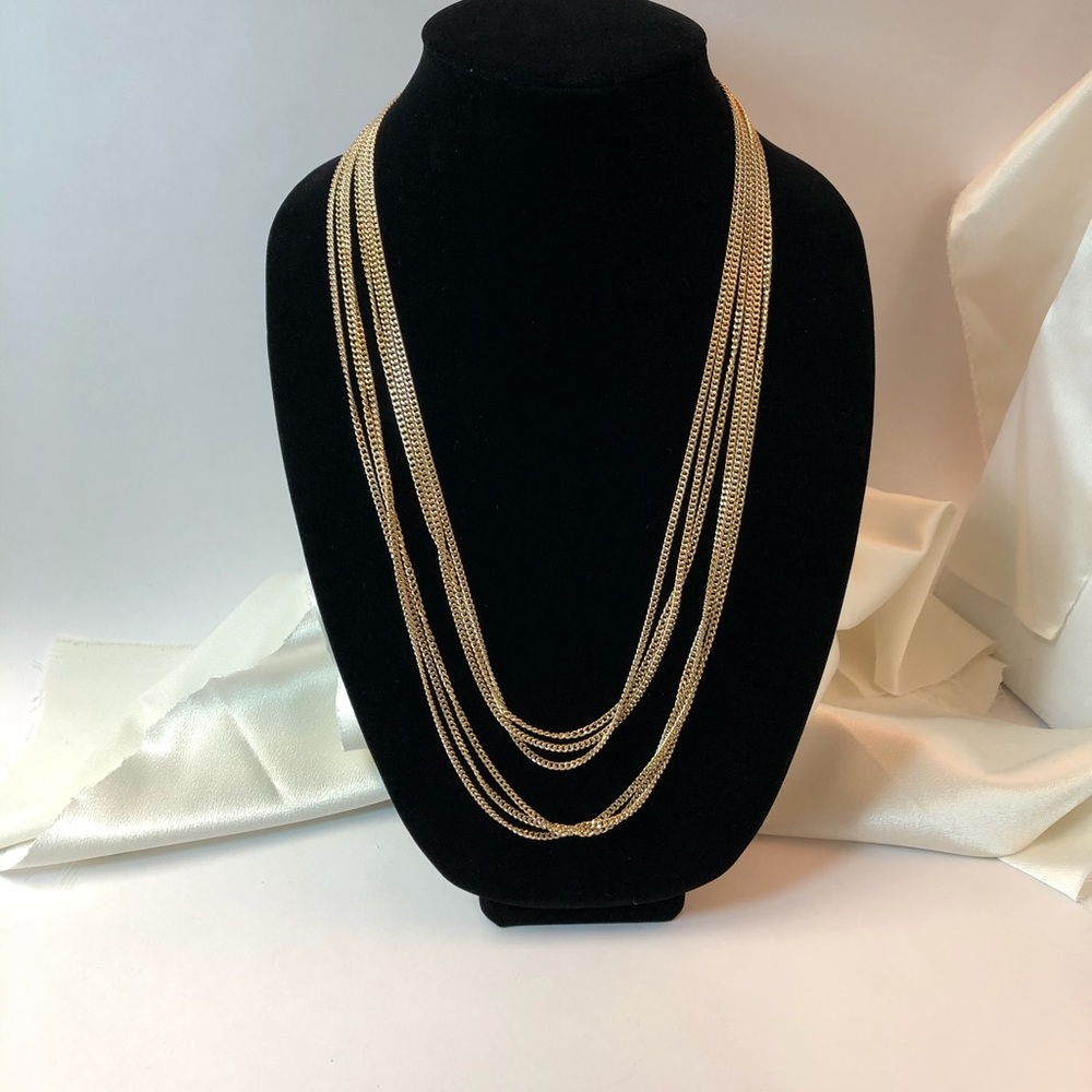 Vintage triple strand gold tone necklace